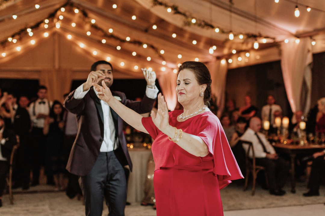 A unique Vizcaya Museum Wedding in Miami The Creatives Loft Weddings Miami groom dancing with mom