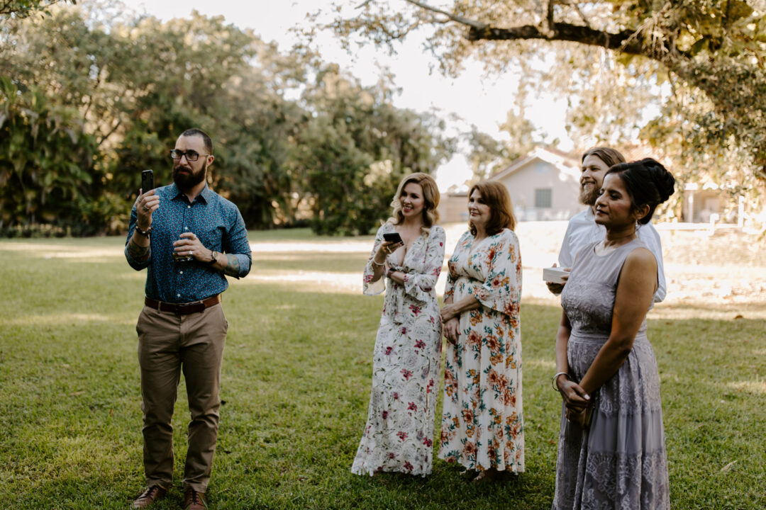 Miami Bohemian Elopement Wedding The Creative's Loft Guests Staring at couple