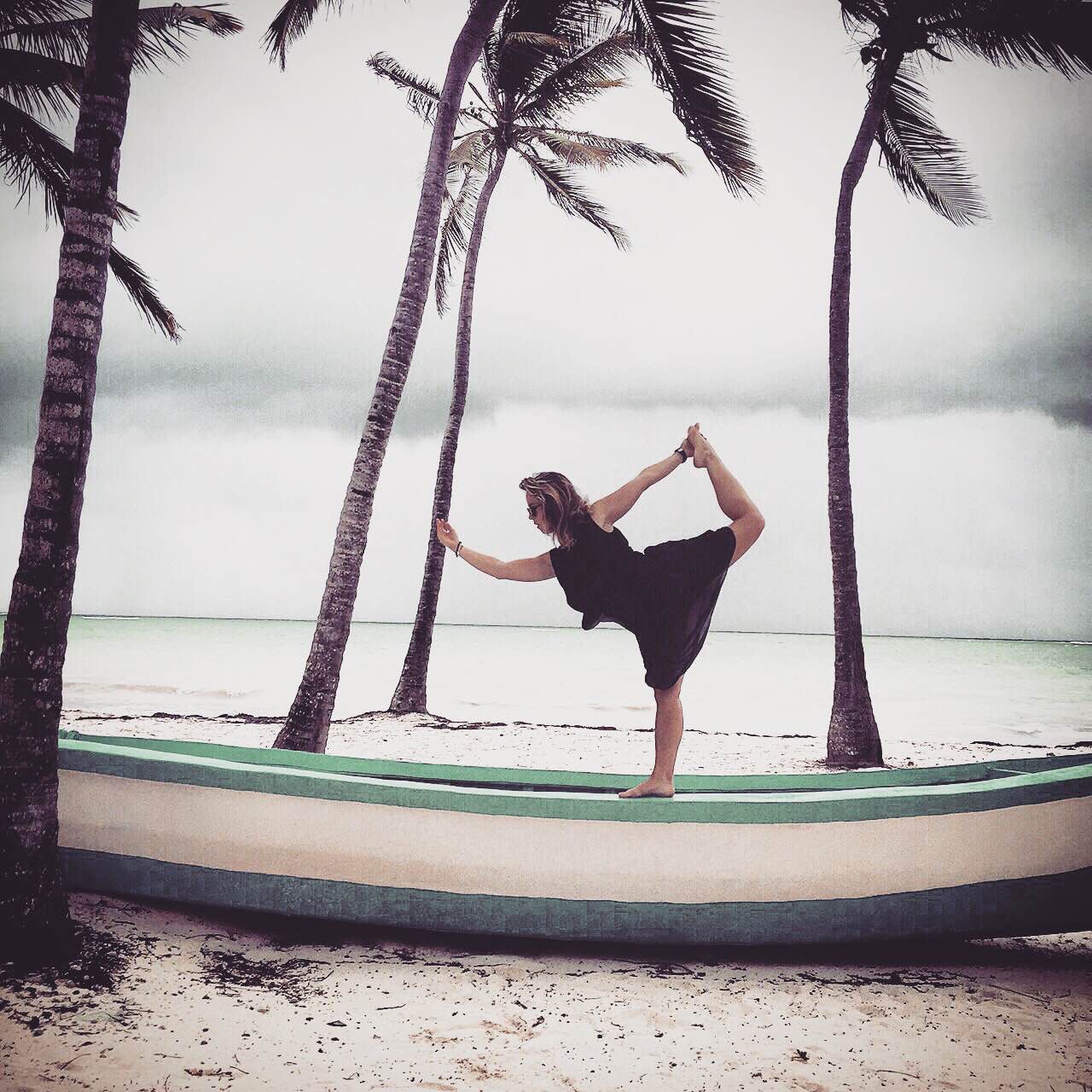 Owner of the creative's loft practicing yoga