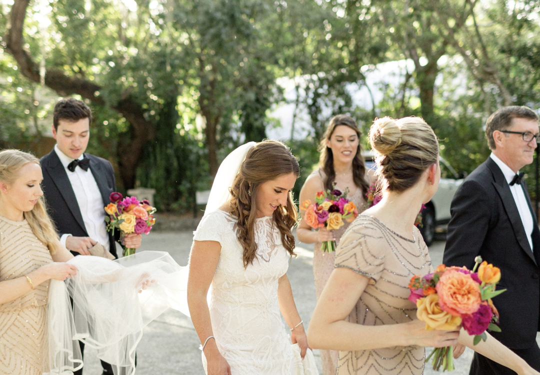 A unique Vizcaya Museum Wedding in Miami The Creatives Loft Weddings Miami escorting the bride