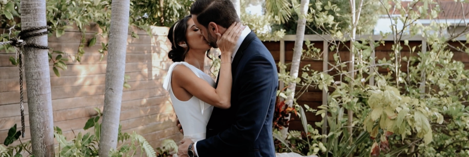 Romantic Industrial Wedding at Penthouse Riverside Wharf. couple kissing during their first look