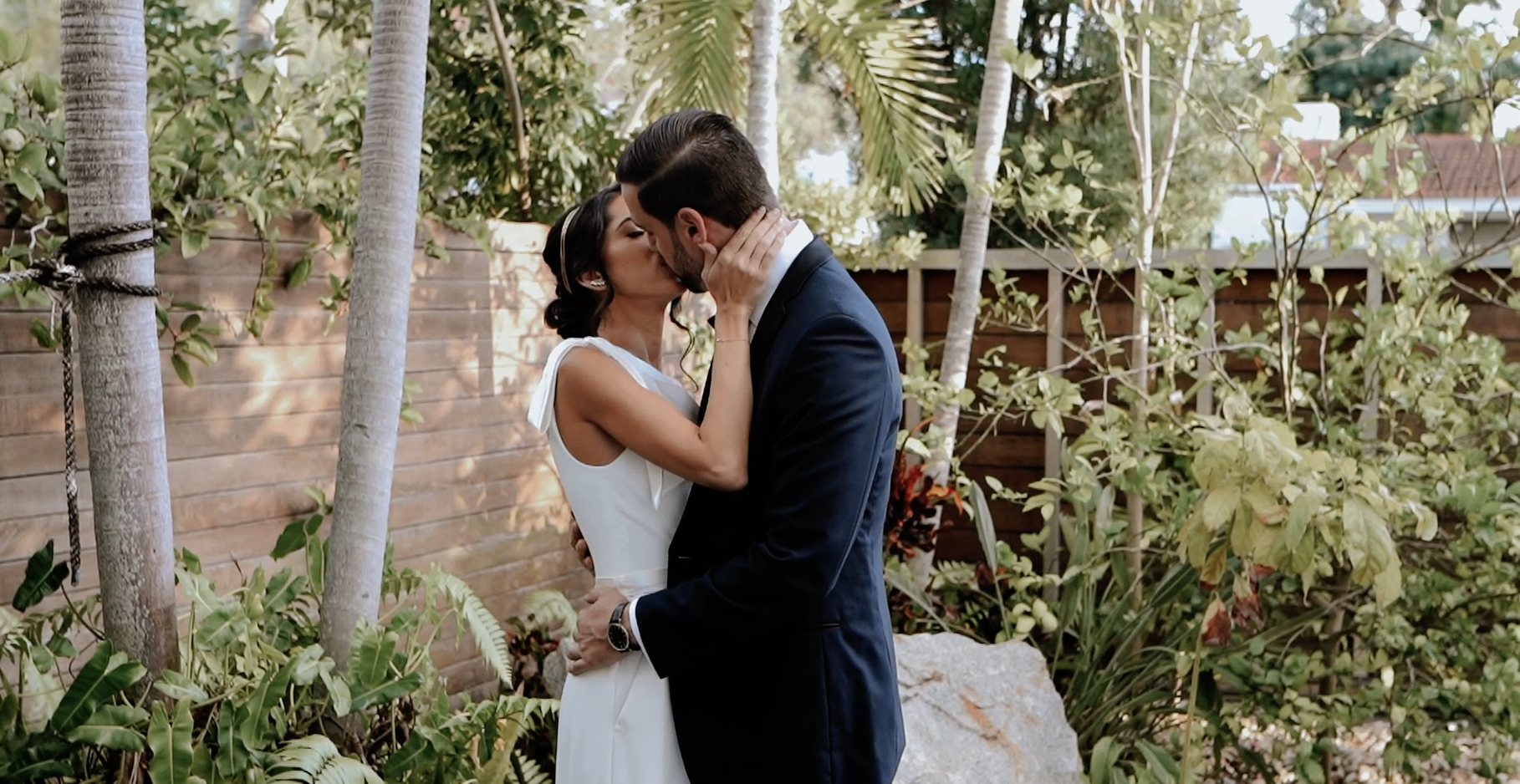 Romantic Industrial Wedding at Penthouse Riverside Wharf. couple kissing during their first look