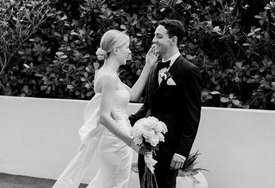 bride and groom looking at each other